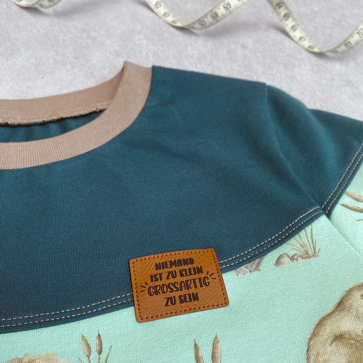 Kunstlederlabel - Niemand ist zu klein, grossartig zu sein