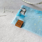 Kinder-Stirnband aus Jersey mit Fischotter und Kunstlederlabel Smiley - Geschenke für Kinder